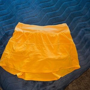 Size 6 light orange pace rival skirt longer length